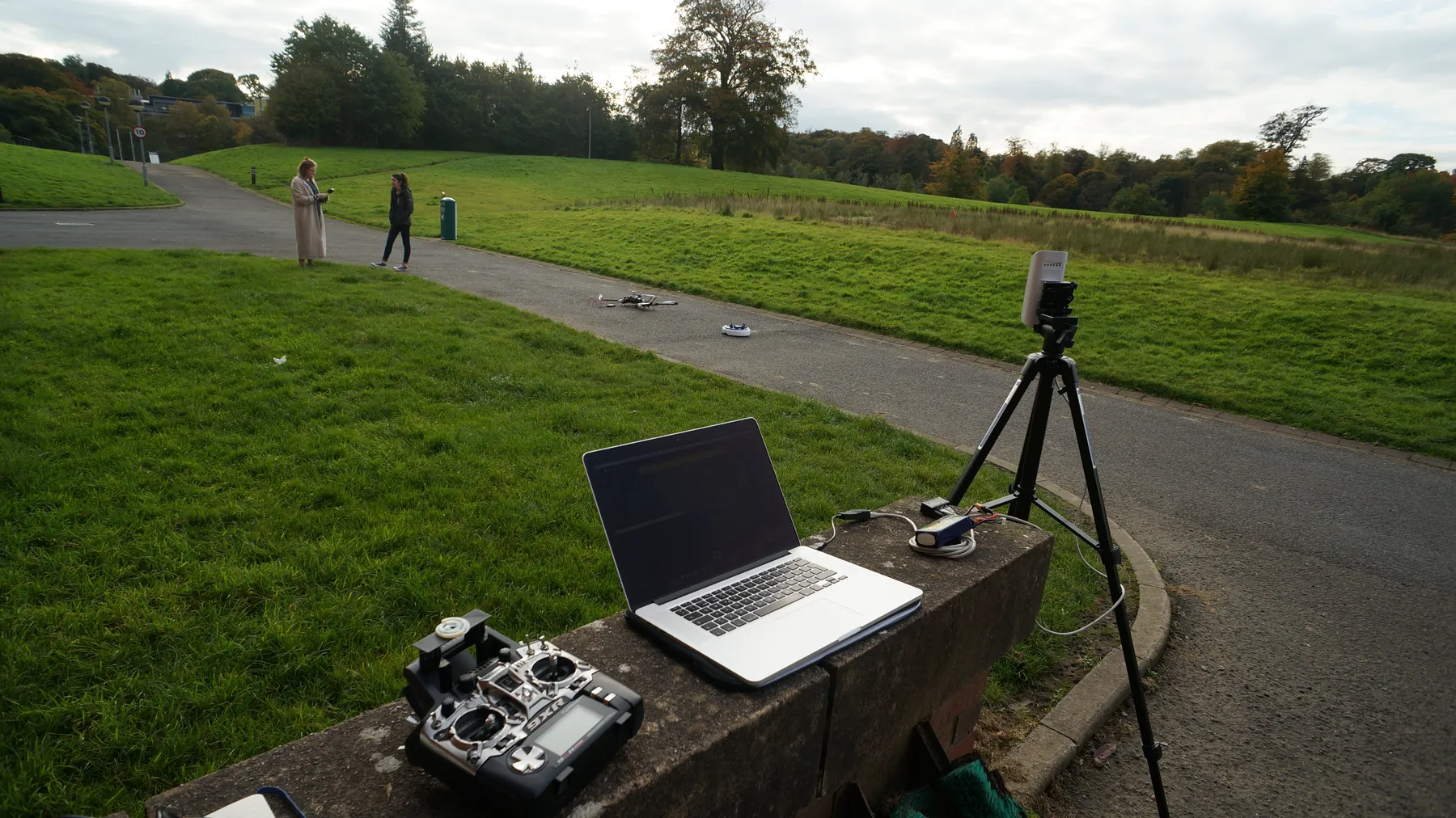 A field ground-control station laptop displaying a live map and flight plot
