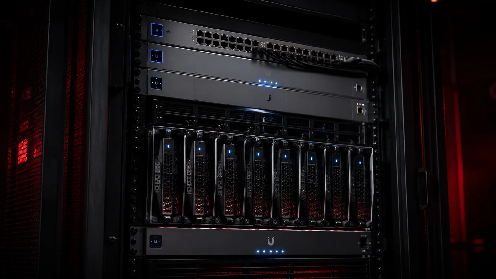 Close view of UniFi rack-mounted compute blades and gateway with status LEDs