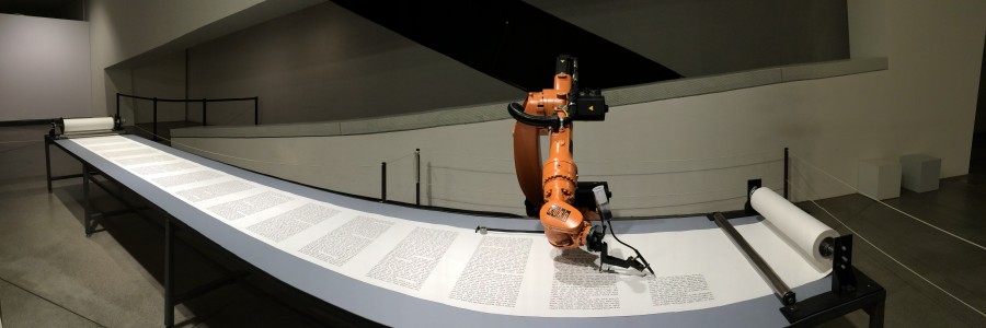 Robot arm writing the Torah